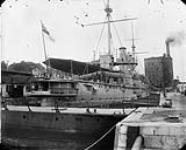 H.M.S. "Ariadne", flagship of North America and West Indies Squadron, in drydock [ca. 1903].