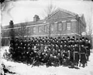 Personnel of 'D' Company, King's Liverpool Regiment, at Wellington Barracks in winter [between 1890-1914].