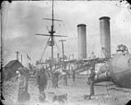 The H.M.S. "Cornwall" alongside wharf [ca. 1906].