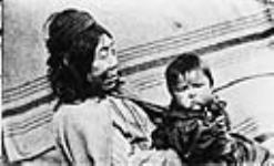 [Quatsino First Nation woman and baby, Quatsino, British Columbia] Original title: Grandma and the baby 1912