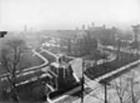 Government House, Toronto, 1867-1912. Bird's-eye view of of the south-east side of residence and grounds from the entrance on Simcoe Street 1908