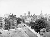 [View of Wellington Street, showing Post Office, Parliament Buildings and Lockmaster's House, Ottawa, Ont