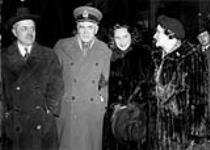General McNaughton, and Mrs. McNaughton greeted by their daughter Leslie on their return to Canada for a visit in 1942 1942