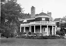 Rear view in grounds of R. L. Borden's Residence [1920's]