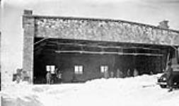 (Relief Projects - No. 5). [View of a hangar] Dec. 1935