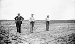 (Relief Projects - No. 9). Sowing grass seeds on No. 3 runway Sept. 1935