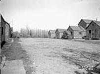 (Relief Projects - No. 14). Main street in the camp Apr. 1935