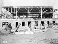 (Relief Projects - No. 15). [Construction of the hangar] Sept. 1935