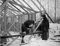 (Relief Projects - No. 21). Carpenters framing timbers Dec. 1933