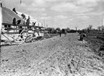 (Relief Projects - No. 28). [Building under construction] Apr. 1933