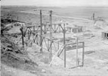 (Relief Projects - No. 27). Erection of steel work for the new land plane hangar Feb. 1936