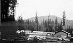 (Relief Projects - No. 64). [A view of the] camp, looking westerly from the new clearing July 1933