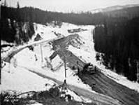 (Relief Projects - No. 64). View of the old road and the new road under construction Feb. 1935