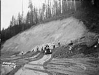 (Relief Projects - No. 64). Cleaning side cut with tractor and scraper June 1935