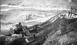 (Relief Projects - No. 66). General view of a crusher, showing the dragline bucket Oct. 1933