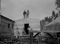 (Relief Projects - No. 103). [Construction of a camp building] Aug. 1934