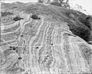Twisted glaciated and contorted gneiss near Montebello