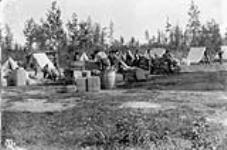 Indian packers from Osnaburgh House at Sandy Lake, [Ont.], 1899