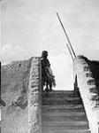 This is a [kwa] in San Ildefonso, which is a pueblo ceremonial chamber. [San Ildefonso is a Tewa village in the Valley of the Rio Grande in north New Mexico] 1926