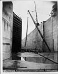 Welland Ship Canal. Erecting lower East leaf Service Gates. Lock No. 2 Nov. 24, 1927