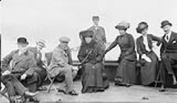 On board tug for Fort Louisburg [N.S.] from l. to r: His Excellency Earl Grey. Mr. J. Butler, Mr. Plummer; Lady Grey; Mrs. Maclennan; Miss Plummer; Miss Maclennan; Lord Lanesborough
