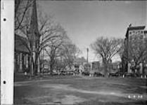 Looking towards corner of Elgin and Laurier from Cartier Square, Ottawa, Ont 6 Apr. 1938