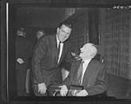 Left to right: Maurice Richard "Rocket" and Fred "Mickey" Ion at the Hockey Hall of Fame induction dinner in 1961 1961
