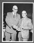 Harry Price (left) inducting Jackie Callura into the Sports Hall of Fame. 1969 1969