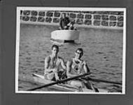 George Hungerford (left) and Rodger Jackson displaying their Gold Medals after winning the Coxless Rowing Pairs at the 1964 Olympics 1964