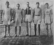 [Left to right: James Duffy, Breward Buxton; Milton Fenn; Tom Longboat; Jim Coritery.] n.d.