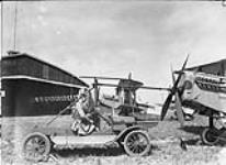 Hucks Starter in use with D.H. 4 aircraft of the Canadian Air Board, High River, Alta., 17 June 1922 17 JUNE 1922