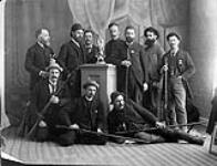 [Shooting champions]. On lower right is Henry John Woodside n.d.