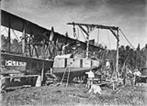 Changing engine on Felixstowe F. 3 flying boat G- CYEN of the Canadian Air Board 8 Aug. 1922