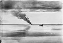 Curtiss HS-2L flying boat G-CYDS of the Canadian Air Board on fire, Victoria Beach, Man., 8 August 1921 8 Aug. 1921