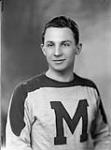 Gus J. Mortson, Defence, St. Michael`s College Hockey Team ca. 1944