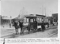Two horse Car with J. Gibbons conductor and J. Badgerow, Driver at Old North Toronto Station [c. 1888] 1924.