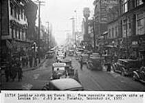 Looking north on Yonge St. from opposite the south side of Louisa Street, [Toronto, Ont.] 2:03 p.m.Tues.Dec.24,1935