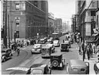 [Adelaide Street looking east from Bay Street, Toronto, Ontario.] [c. 1935]