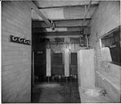 [Toronto, Ont.] Interior view of lavatory [Queen & Spadina, c. 1900.] [ca. 1900]