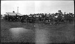 Horses and buggies at a Fair ca. 1910