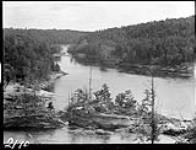 Gatineau River above the dam at Chelsea before Power development. Looking down towards damsite from look-out point.[P.Q.] 1923