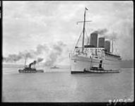 [Tugs docking C.P.S. "Empress of Britain", Quebec City, P.Q., 1932.] 1932