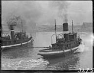 [Tugs, Montreal, P.Q., 1931, ("Fredmac" on the right).] 1931