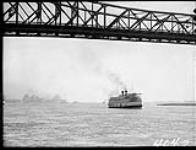 [C.S.L. "Quebec" under the Jacques Cartier Bridge, Montreal, P.Q., 1933.] 1933