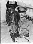 Lieutenant-Colonel R.S. Timmis, Royal Canadian Dragoons with "Red Prophet", stanley barracks Oct. 1933