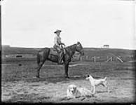 Reginald S. Timmis riding "Darkie" Trochu Valley 29 Aug. 1908
