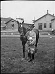 Lieutenant-Colonel R.S. Timmis, Royal Canadian Dragoons with "Holiday" and Hethrington Cup 15 Sept. 1936