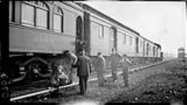 Trainmen cooling a hot box 24 Mar. 1914