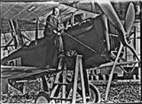 Overhauling engine on G.Y.C.D. aircraft ca. 1921
