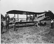 De Havilland D.H.9A aircraft G-CYAZ of the Canadian Air Board at Ottawa Air Station. Lieutenant-Colonel Robert Leckie is standing at extreme left 1921 - 1922